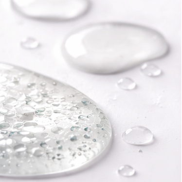 Close-up of water droplets on a white background